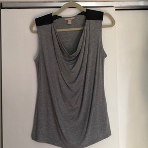 Grey sleeveless cowl neck with faux leather accent